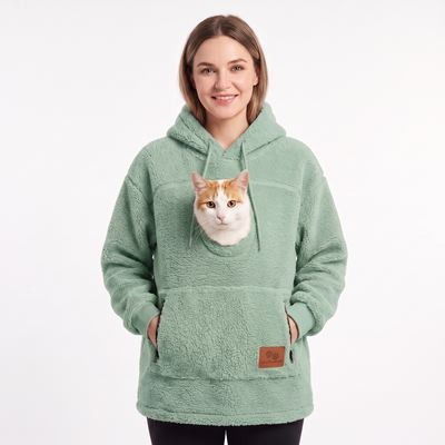 Pawket pet pouch hoodie in Mint with a ginger and white cat